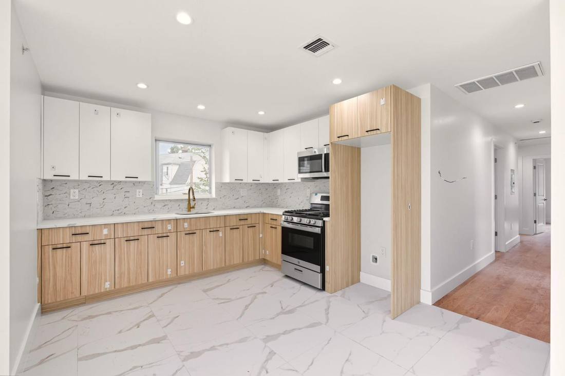 White kitchen cabinetry and countertops